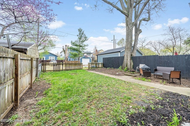 view of yard featuring a fenced backyard