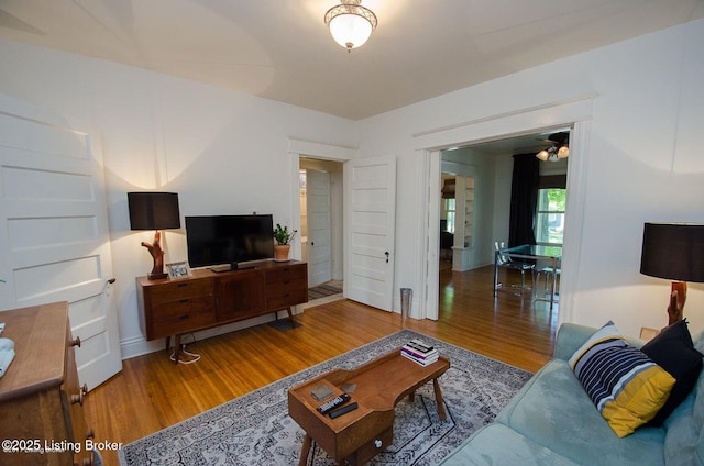 living area with wood finished floors