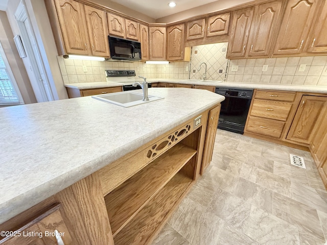235 Ashford Dr, Mt Washington, KY 40047 - kitchen with black appliances, a sink, light countertops, and recessed lighting