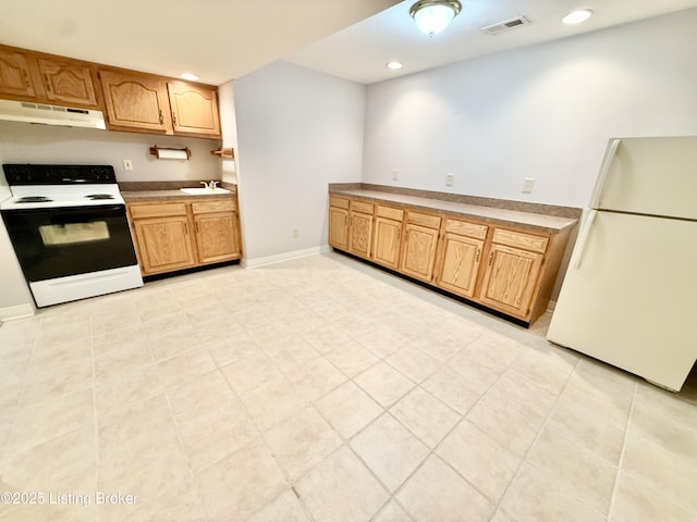 235 Ashford Dr, Mt Washington, KY 40047 - kitchen featuring range with electric stovetop, freestanding refrigerator, under cabinet range hood, a sink, and recessed lighting