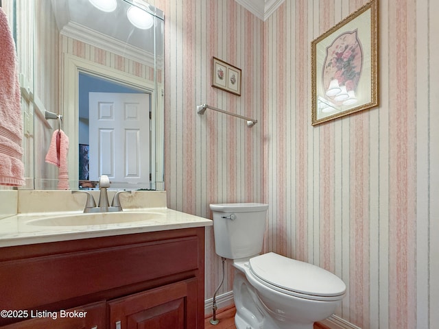 235 Ashford Dr, Mt Washington, KY 40047 - bathroom with vanity, toilet, wallpapered walls, ornamental molding, and baseboards