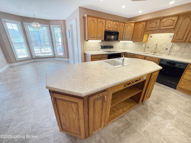 235 Ashford Dr, Mt Washington, KY 40047 - kitchen featuring black appliances, a sink, baseboards, light countertops, and recessed lighting
