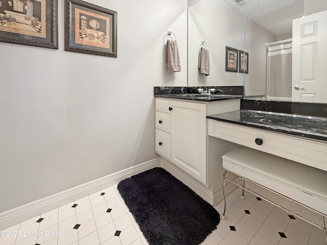 235 Ashford Dr, Mt Washington, KY 40047 - bathroom featuring vanity, baseboards, and tile patterned flooring