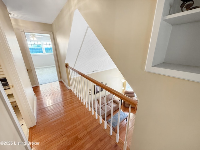 235 Ashford Dr, Mt Washington, KY 40047 - stairs featuring wood finished floors, a ceiling fan, and baseboards