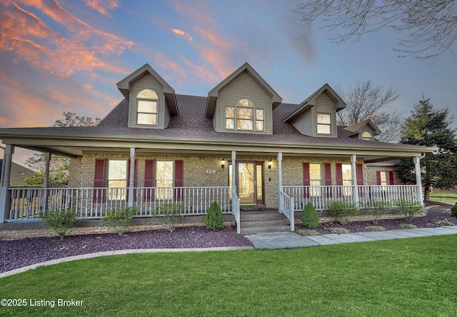 235 Ashford Dr, Mt Washington, KY 40047 - country-style home with brick siding, covered porch, a front yard, and roof with shingles