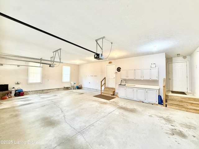 235 Ashford Dr, Mt Washington, KY 40047 - garage with a garage door opener
