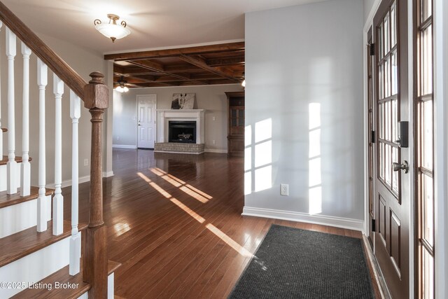 1110 Clark Station Rd, Fisherville, KY 40023 - interior space with ceiling fan, a fireplace with raised hearth, coffered ceiling, baseboards, and hardwood / wood-style flooring