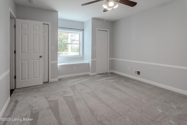 1110 Clark Station Rd, Fisherville, KY 40023 - unfurnished bedroom featuring carpet flooring, baseboards, a ceiling fan, and visible vents