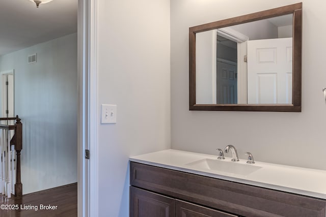 1110 Clark Station Rd, Fisherville, KY 40023 - bathroom with vanity, visible vents, and wood finished floors