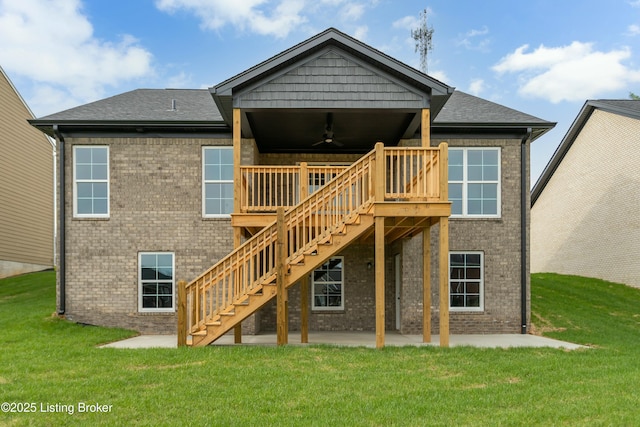 382 Williamsburg Dr, Mt Washington, KY 40047 - back of property with a ceiling fan, brick siding, stairs, and a yard