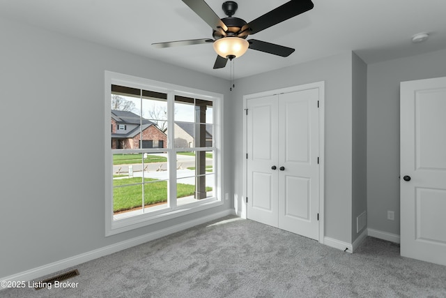 382 Williamsburg Dr, Mt Washington, KY 40047 - unfurnished bedroom featuring a closet, ceiling fan, carpet, baseboards, and visible vents