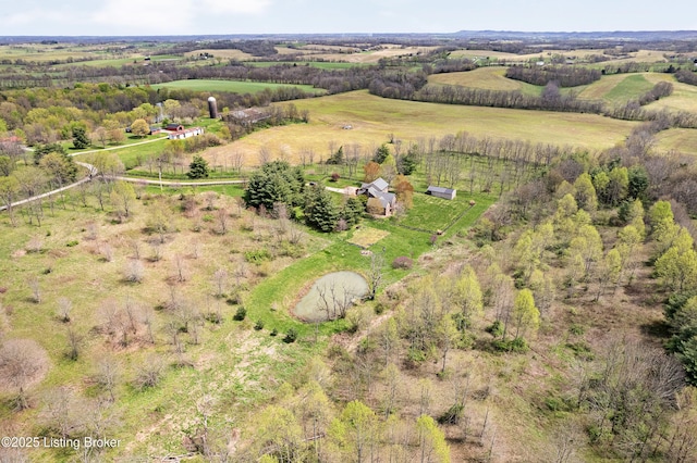 birds eye view of property featuring a rural view