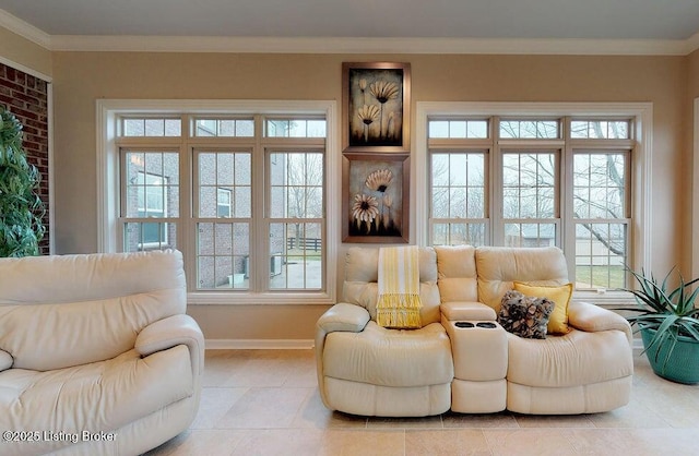interior space with baseboards and crown molding