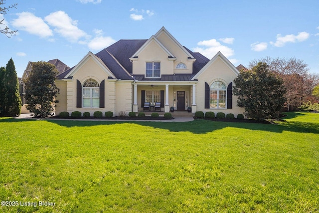 4232 Ashleywood Ct, Louisville, KY 40241 - view of front facade with a front yard, metal roof, covered porch, and a standing seam roof