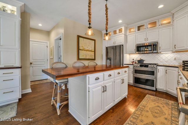 4232 Ashleywood Ct, Louisville, KY 40241 - kitchen with wooden counters, a center island, white cabinetry, and appliances with stainless steel finishes