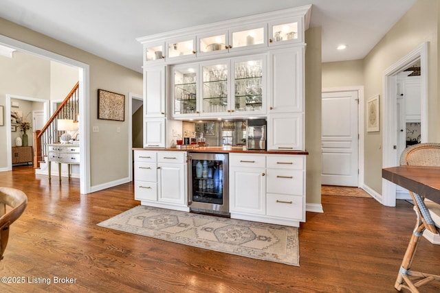 4232 Ashleywood Ct, Louisville, KY 40241 - bar with wine cooler, stairway, bar area, and dark wood-type flooring