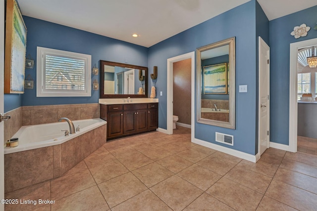 4232 Ashleywood Ct, Louisville, KY 40241 - bathroom featuring visible vents, a bath, toilet, vanity, and tile patterned floors