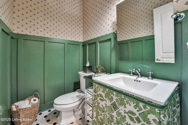 4232 Ashleywood Ct, Louisville, KY 40241 - bathroom featuring a decorative wall, a sink, toilet, wallpapered walls, and tile patterned flooring