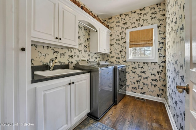 4232 Ashleywood Ct, Louisville, KY 40241 - clothes washing area featuring baseboards, wallpapered walls, washer and clothes dryer, cabinet space, and a sink