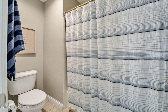 4232 Ashleywood Ct, Louisville, KY 40241 - full bath featuring tile patterned floors, curtained shower, baseboards, and toilet