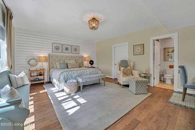 4232 Ashleywood Ct, Louisville, KY 40241 - bedroom featuring baseboards, ensuite bath, and wood finished floors
