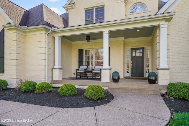4232 Ashleywood Ct, Louisville, KY 40241 - property entrance featuring covered porch, ceiling fan, and brick siding