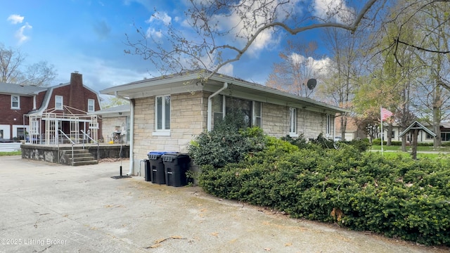 901 S 47th St, Louisville, KY 40211 - view of home's exterior with stone siding