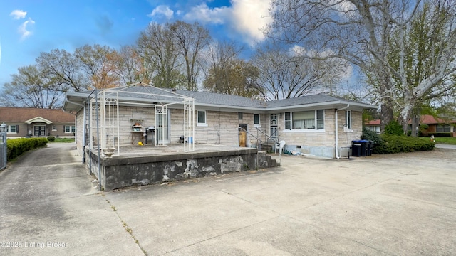 901 S 47th St, Louisville, KY 40211 - back of property featuring stone siding