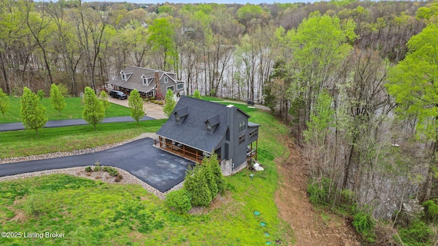 aerial view with a wooded view