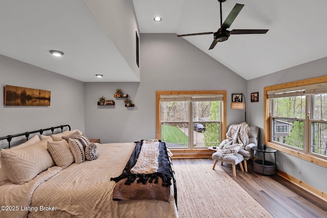 bedroom featuring baseboards, recessed lighting, ceiling fan, high vaulted ceiling, and wood finished floors