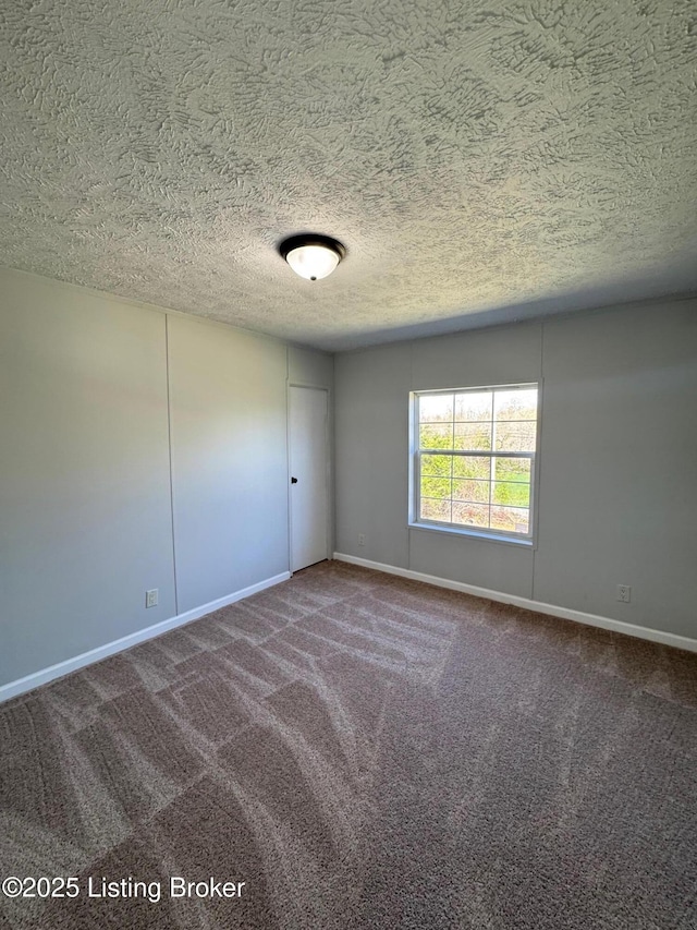 490 Blackjack Rd, Radcliff, KY 40160 - unfurnished room with baseboards, a textured ceiling, and carpet