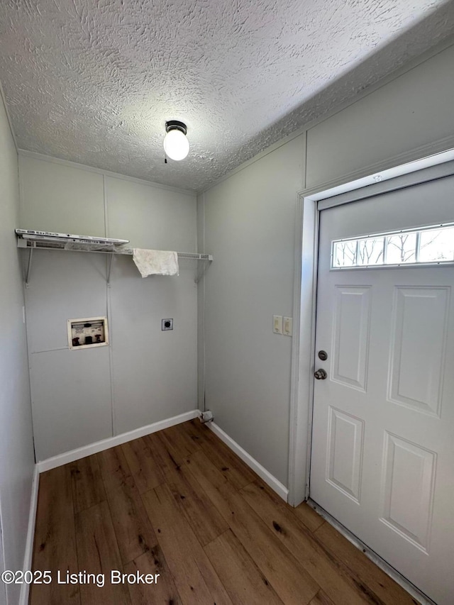 490 Blackjack Rd, Radcliff, KY 40160 - washroom featuring hookup for an electric dryer, hookup for a washing machine, wood finished floors, a textured ceiling, and baseboards