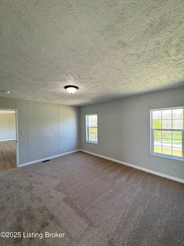 490 Blackjack Rd, Radcliff, KY 40160 - unfurnished room featuring a textured ceiling, carpet, and baseboards