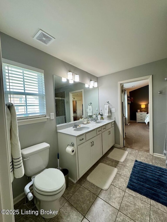 117 Richwood Cir, Georgetown, KY 40324 - bathroom with a shower stall, toilet, tile patterned floors, double vanity, and ensuite bath