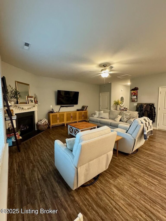 117 Richwood Cir, Georgetown, KY 40324 - living area featuring wood finished floors, a ceiling fan, and a fireplace