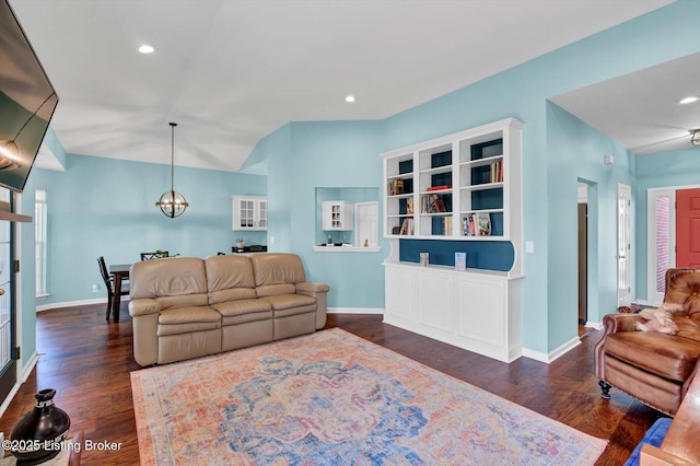 living room with baseboards and wood finished floors