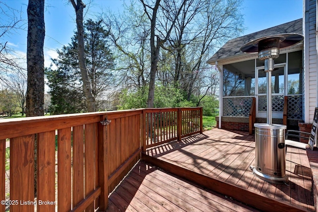 deck featuring a sunroom