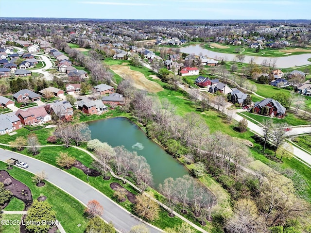 bird's eye view featuring golf course view, a residential view, and a water view