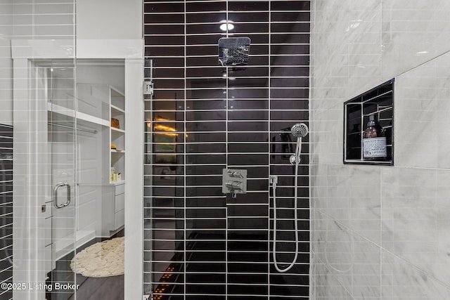 full bathroom featuring a stall shower