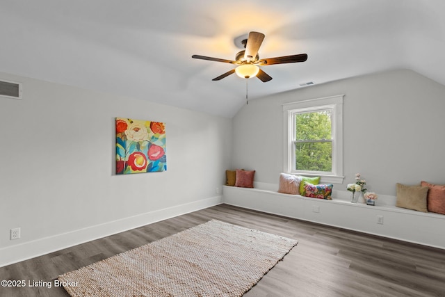 playroom with visible vents, ceiling fan, wood finished floors, and vaulted ceiling