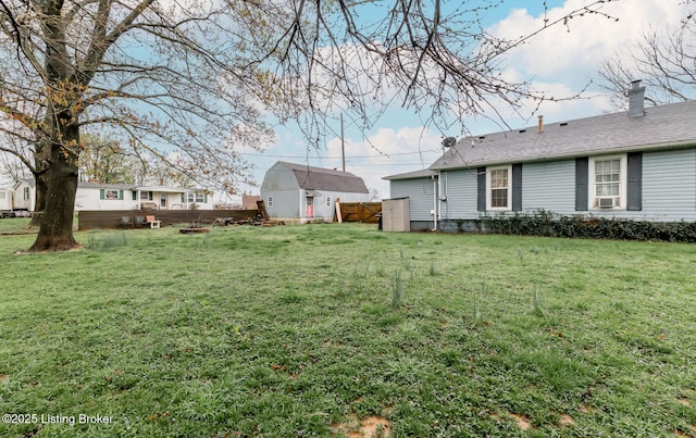 310 Wentworth Ave, Bedford, KY 40006 - view of yard with an outbuilding, fence, and a storage unit