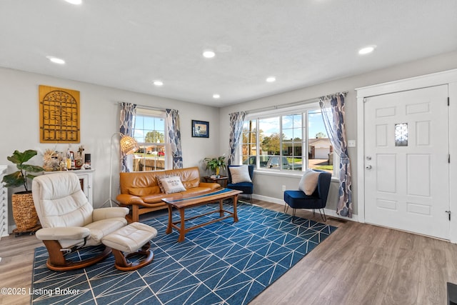 6201 Manse Dr, Louisville, KY 40258 - living area with wood finished floors, recessed lighting, and a healthy amount of sunlight