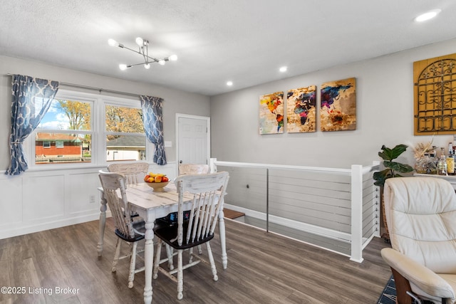 6201 Manse Dr, Louisville, KY 40258 - dining room with a decorative wall, a chandelier, a textured ceiling, recessed lighting, and wood finished floors
