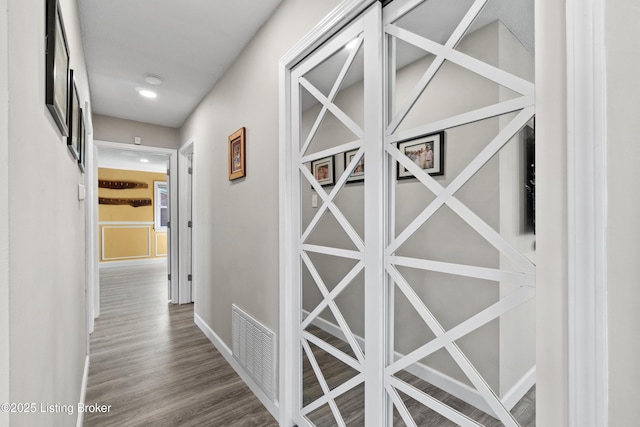 6201 Manse Dr, Louisville, KY 40258 - corridor with visible vents, baseboards, and wood finished floors