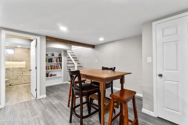 6201 Manse Dr, Louisville, KY 40258 - dining room with wood finished floors, recessed lighting, baseboards, and stairway