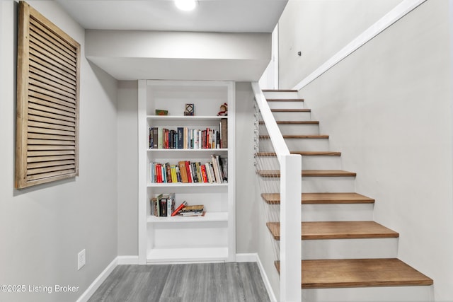 6201 Manse Dr, Louisville, KY 40258 - stairs featuring baseboards, wood finished floors, and built in shelves