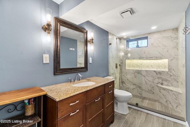 6201 Manse Dr, Louisville, KY 40258 - full bath featuring vanity, visible vents, a marble finish shower, and toilet