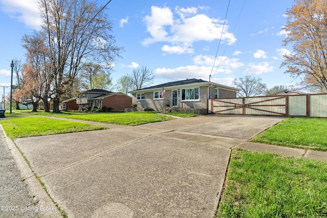 6201 Manse Dr, Louisville, KY 40258 - ranch-style home featuring brick siding, a front lawn, a gate, and driveway