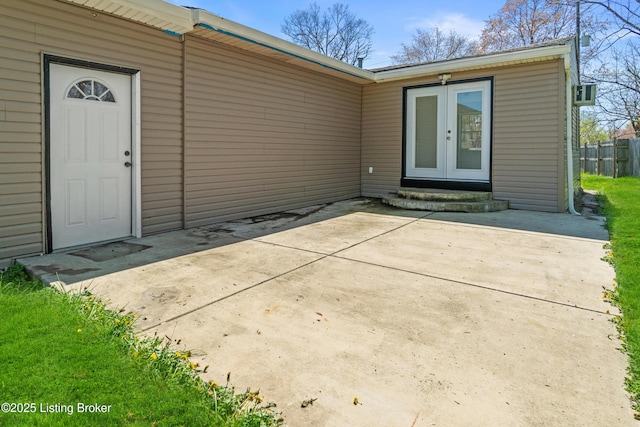8006 Bramble Ln, Louisville, KY 40258 - entrance to property featuring french doors, a patio area, and fence
