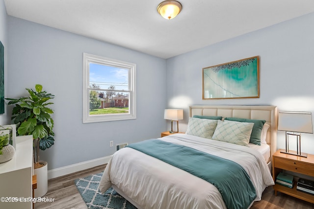 8006 Bramble Ln, Louisville, KY 40258 - bedroom with wood finished floors and baseboards
